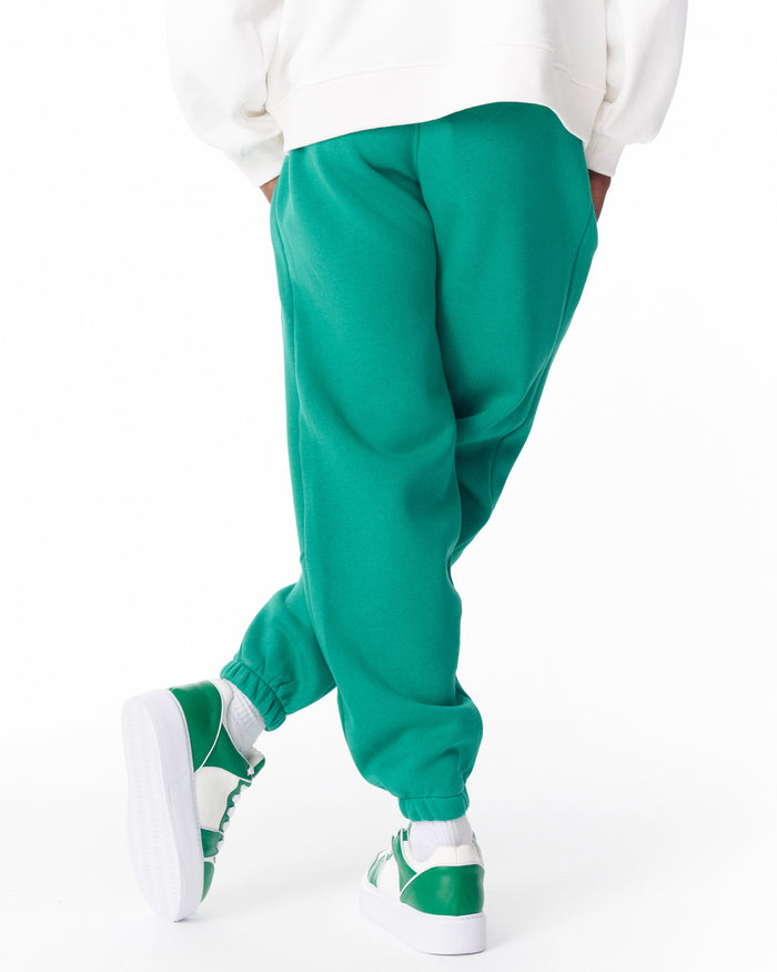 Martin Valen green jogger full leg view with matching green sneakers and elasticated ankle cuffs