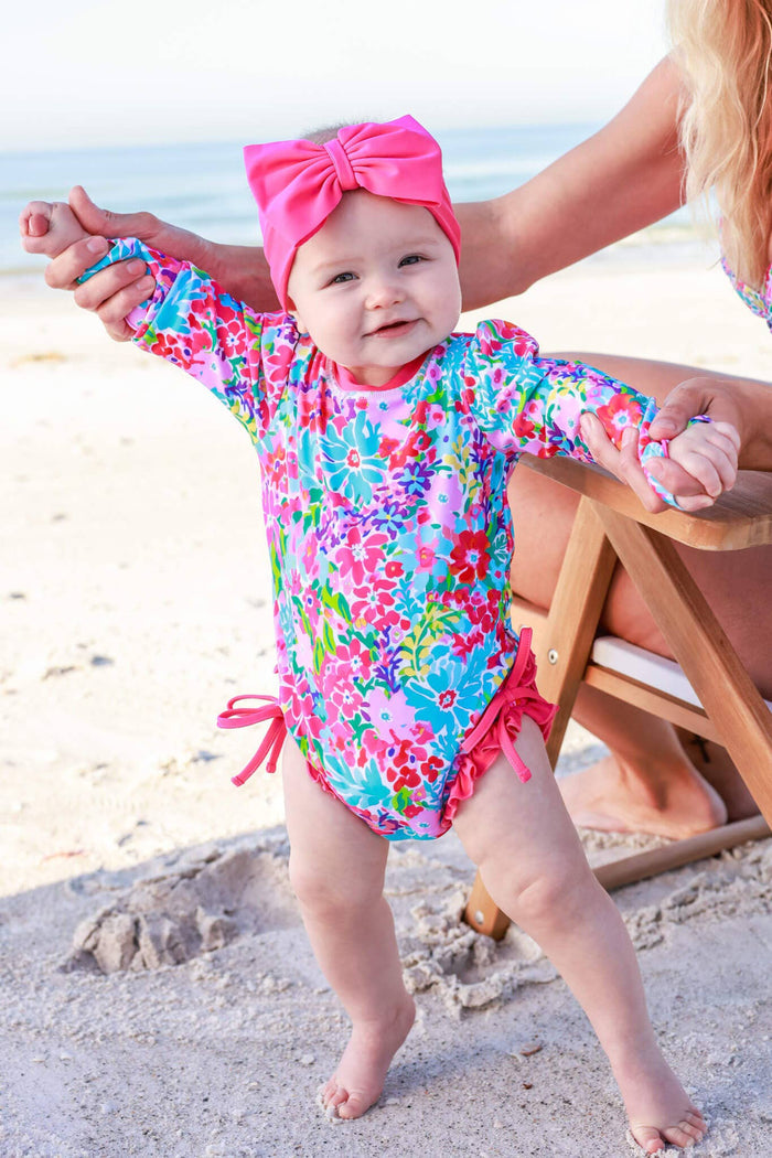 Long Sleeve Rash Guard With Ruffle Bottom- Petal Splash by Caden Lane